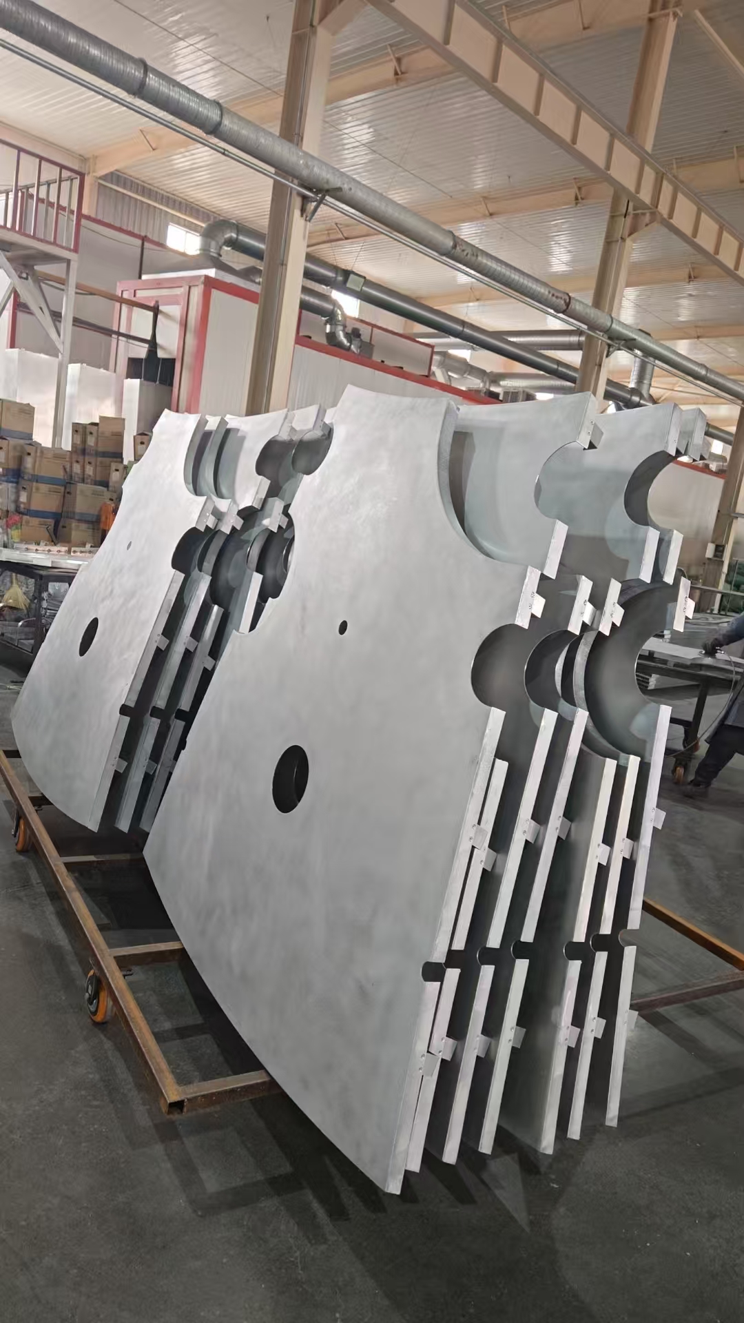 Fabrication photo of a perforated shaped aluminum solid panel component