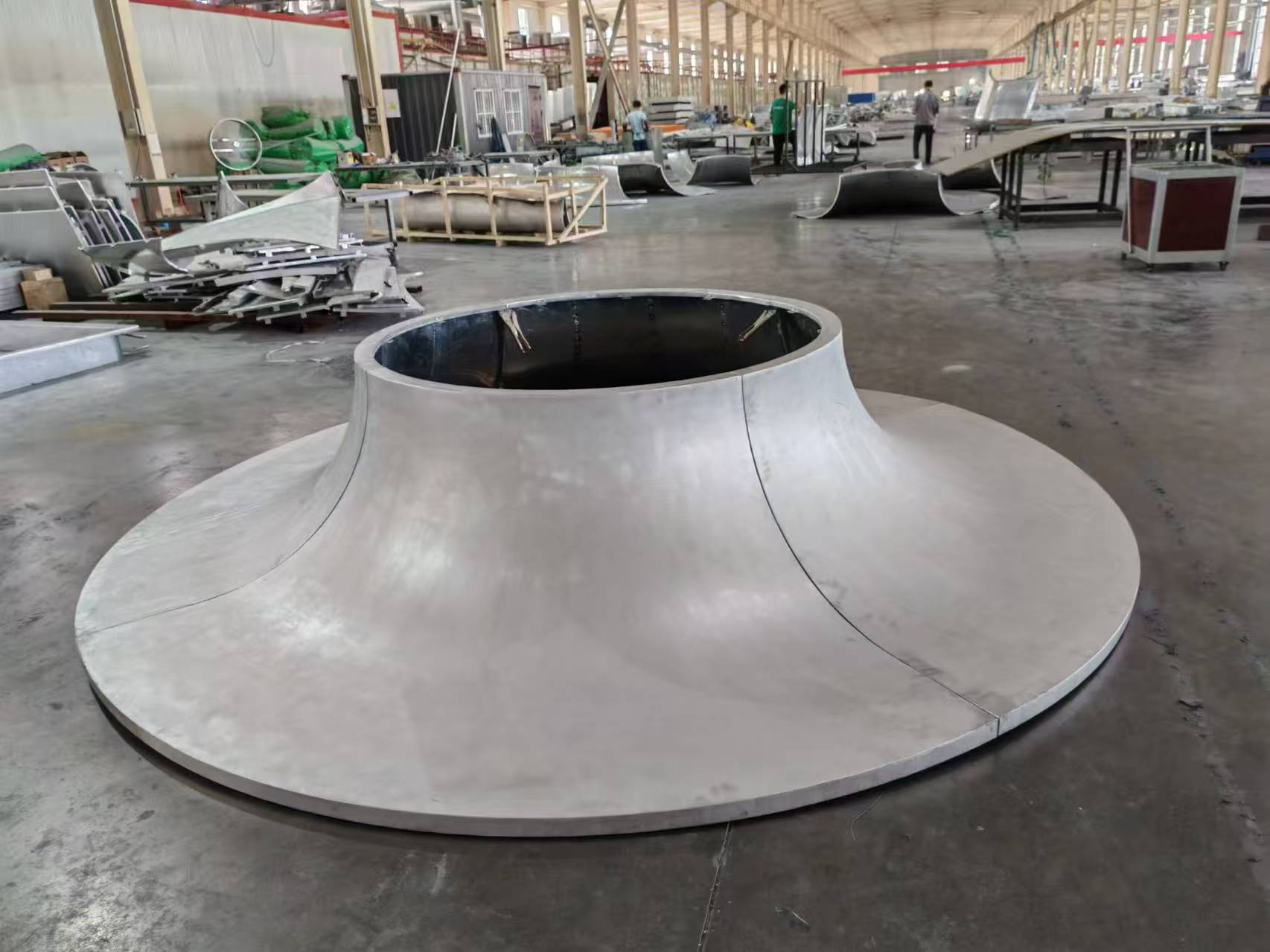 Double-curved aluminum component