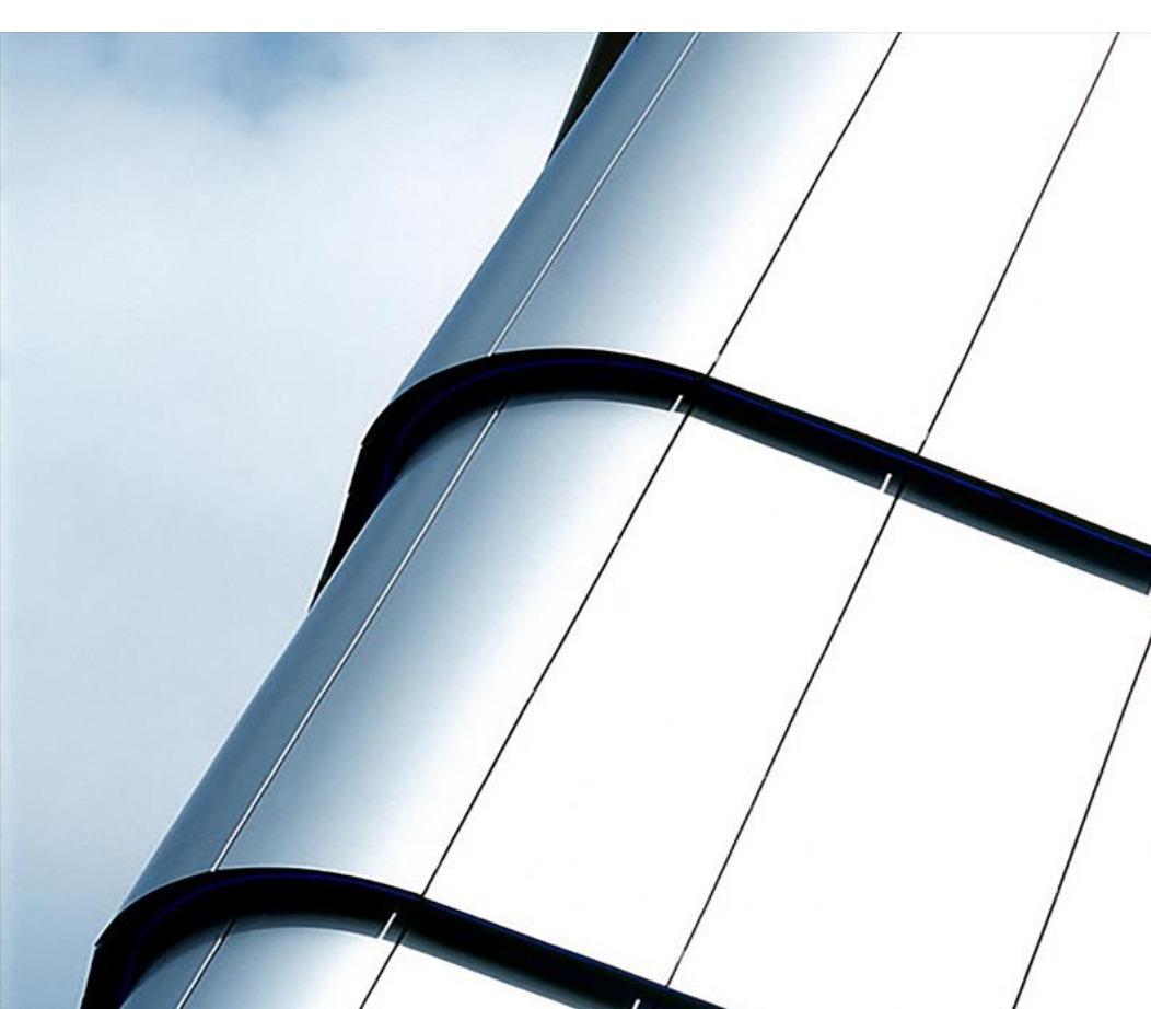 Curved façade termination using aluminum honeycomb panels